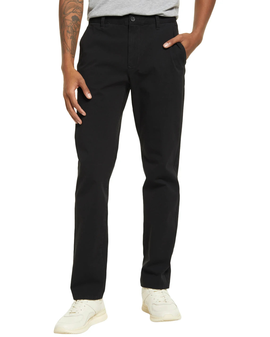 Model in DexonMen black casual chinos – classic - fit, ideal for daily leisure, paired with white sneakers