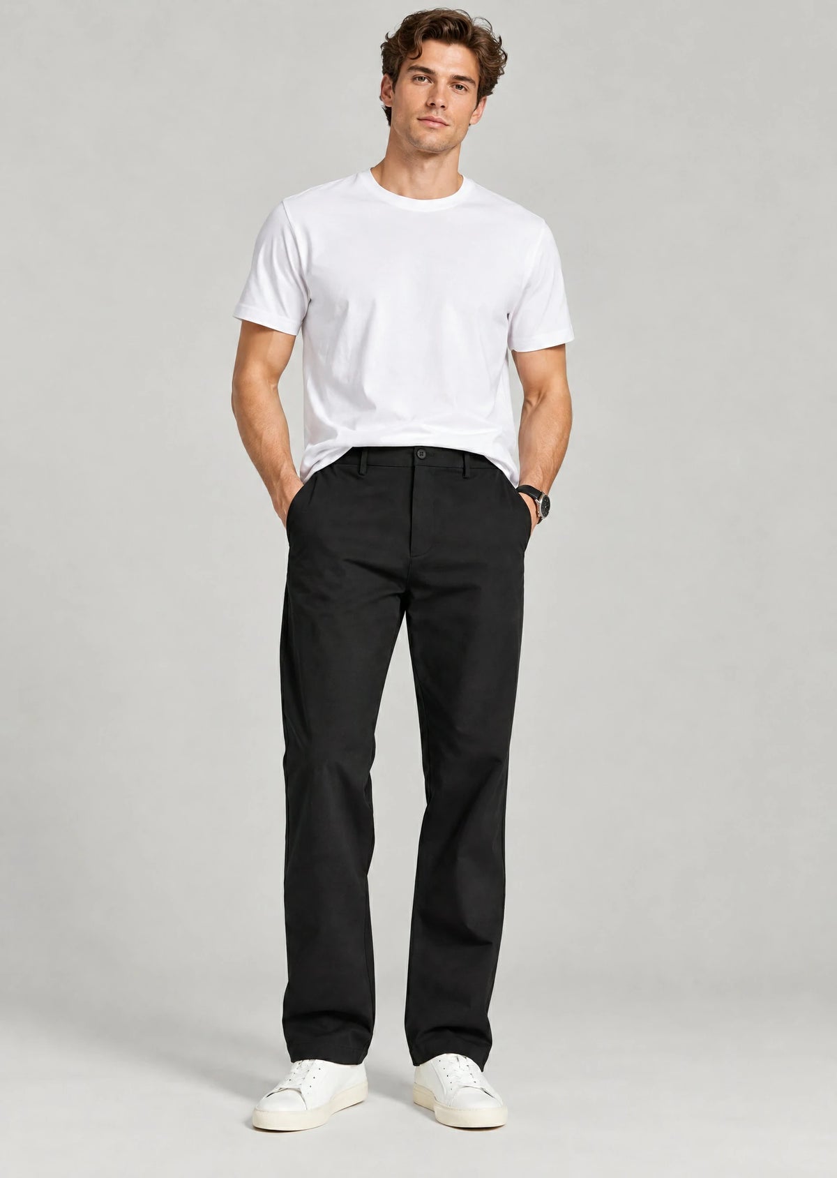 Man wearing classic fit black cotton pants with white t-shirt, versatile men's business casual work outfit