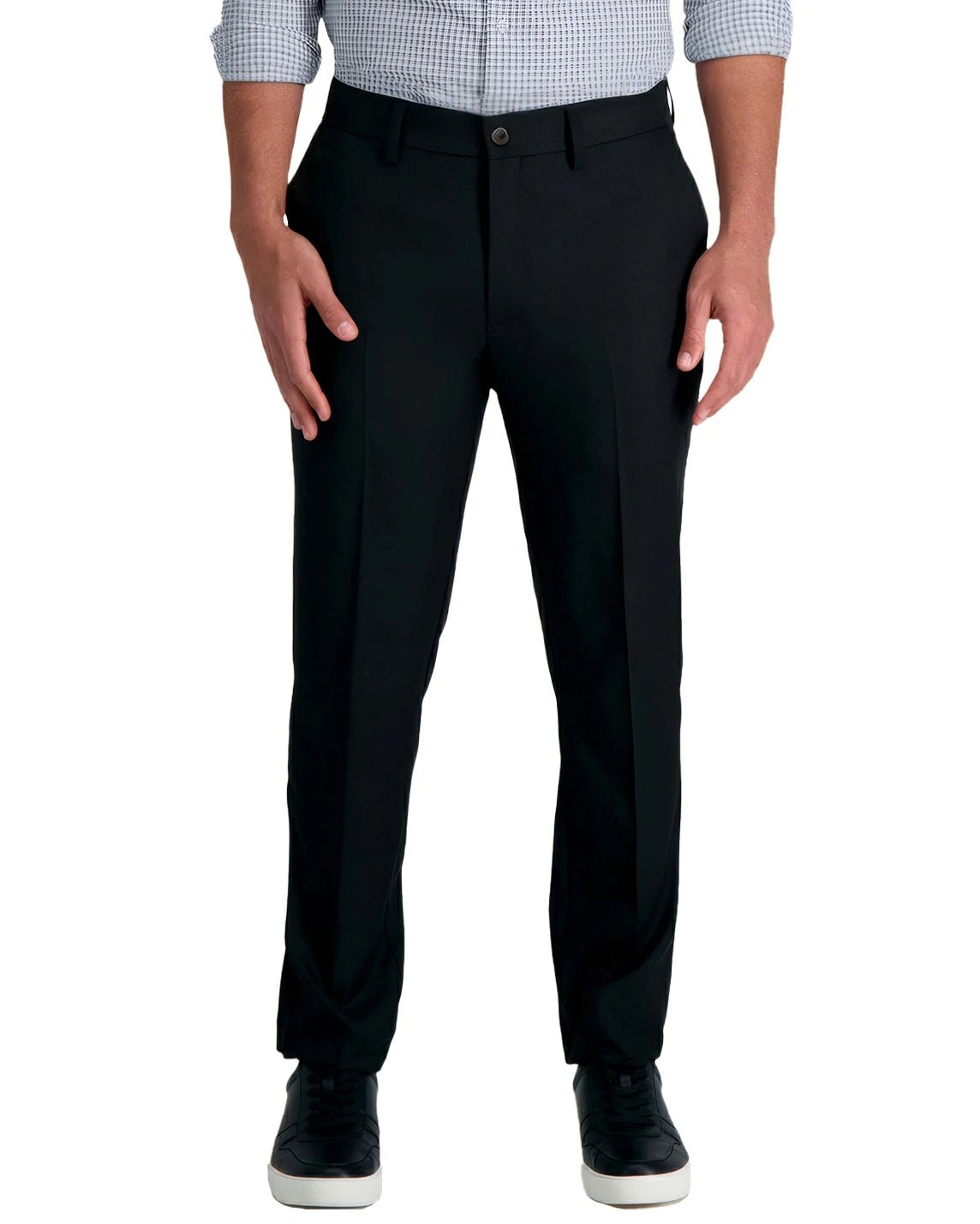 front view of a man wearing solid black stretch pants with button and zipper closure