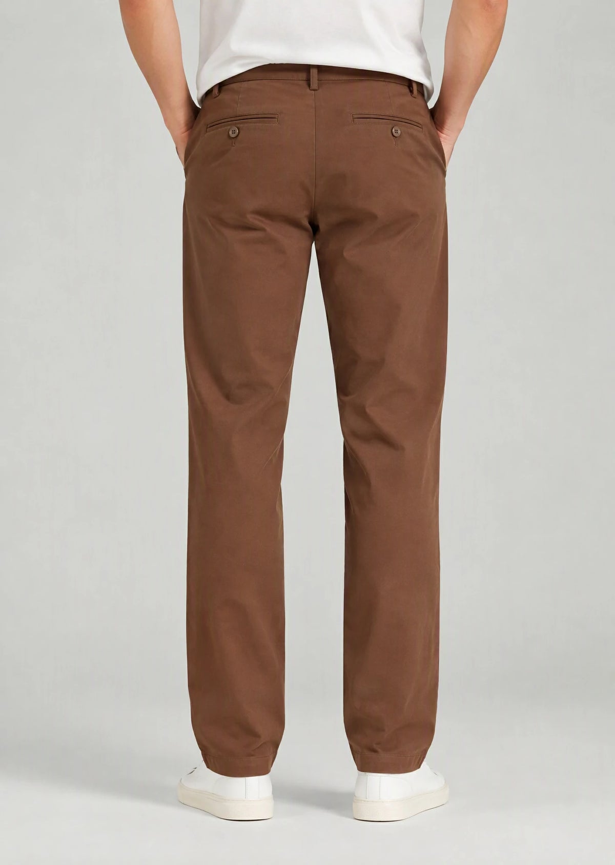 Back view of men's classic fit brown cotton pants with button welt back pockets, non-stretch casual trousers