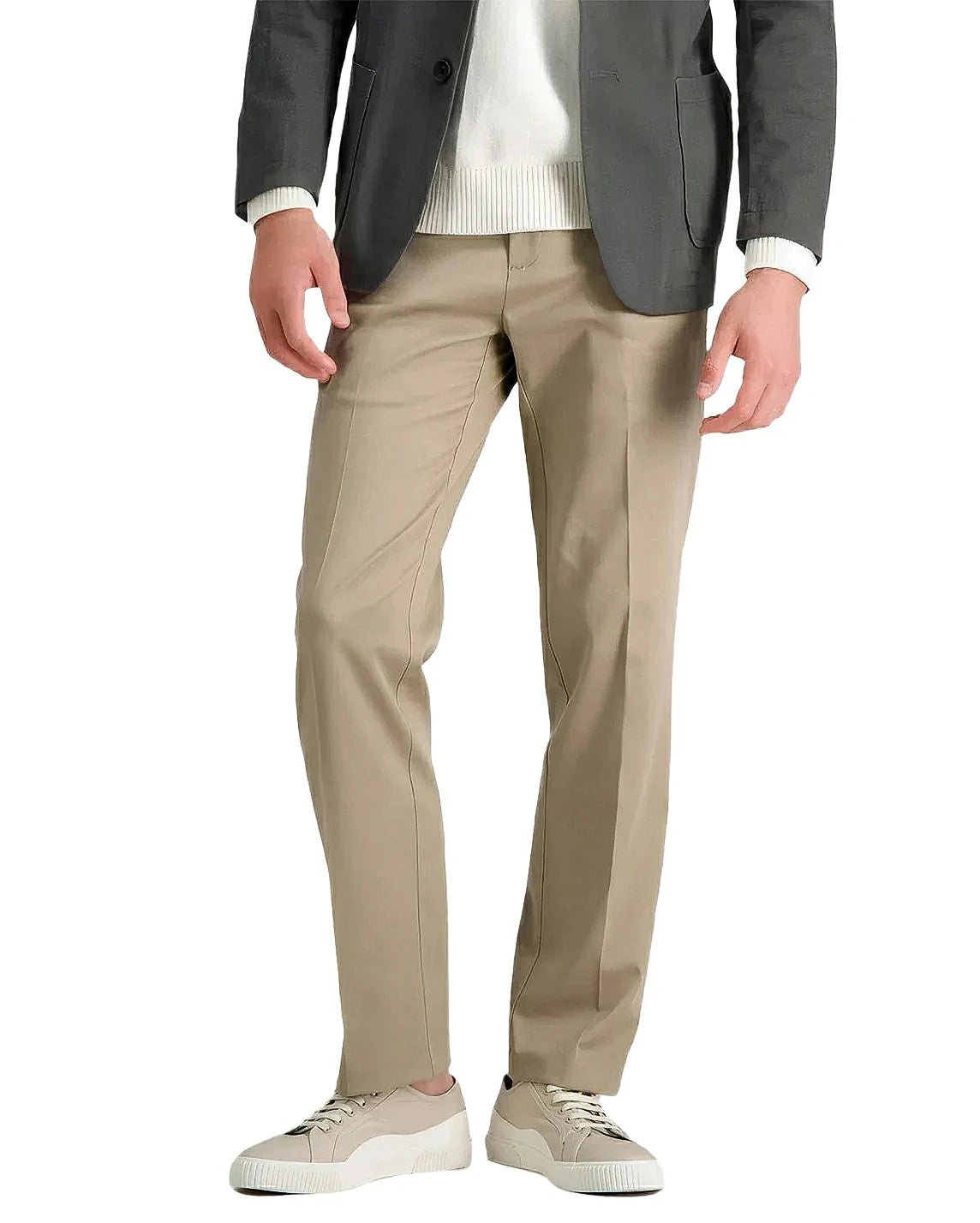 front view of a man wearing solid khaki casual pants with button and zipper closure