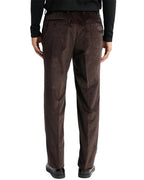 back view of a man wearing solid brown corduroy pants with button back pockets
