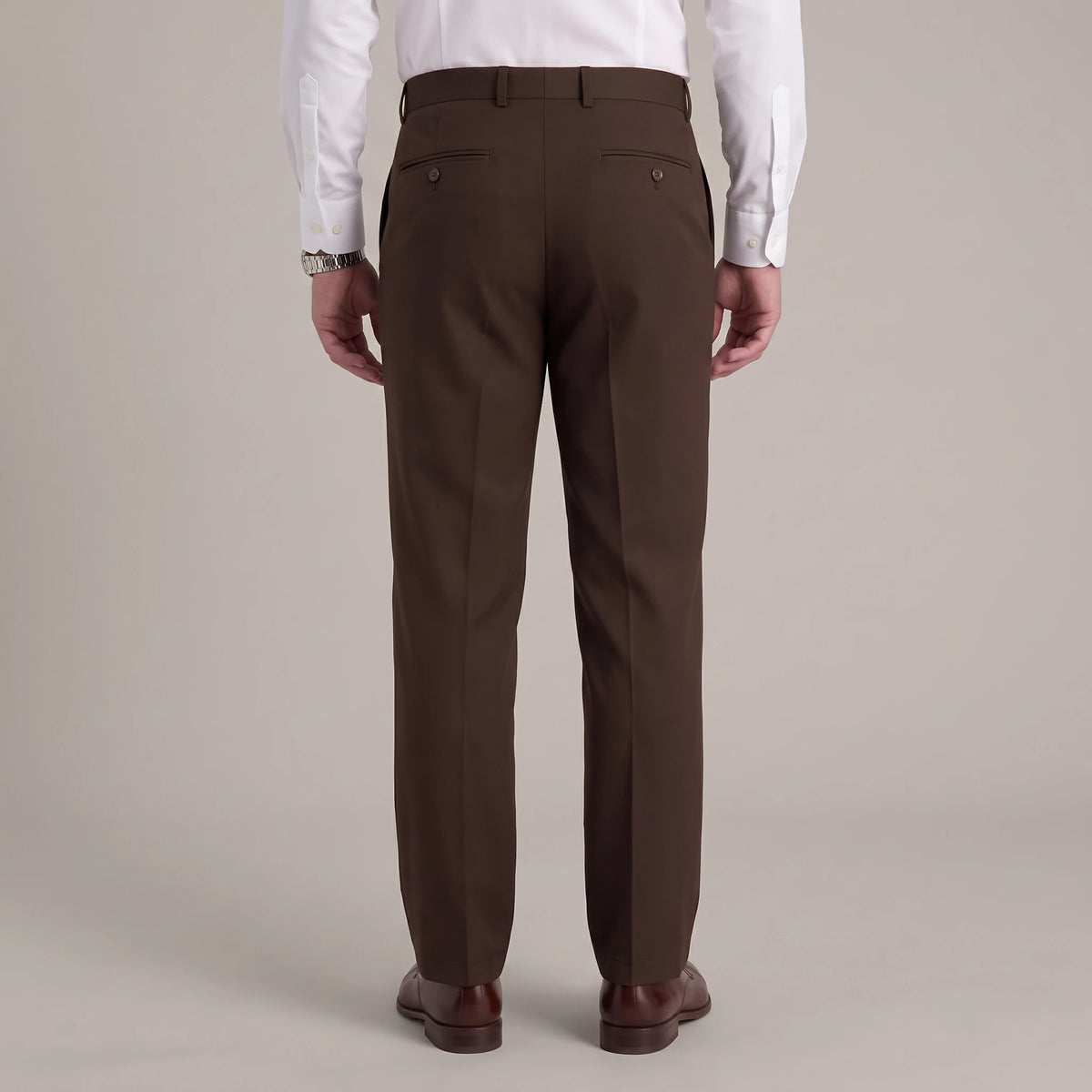 Back view of Dexonmen men's chocolate classic fit dress pants with two buttoned back pockets