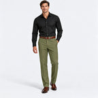 Man wearing Dexonmen Men's Classic Fit Olive Dress Pants with black dress shirt – formal business casual office outfit