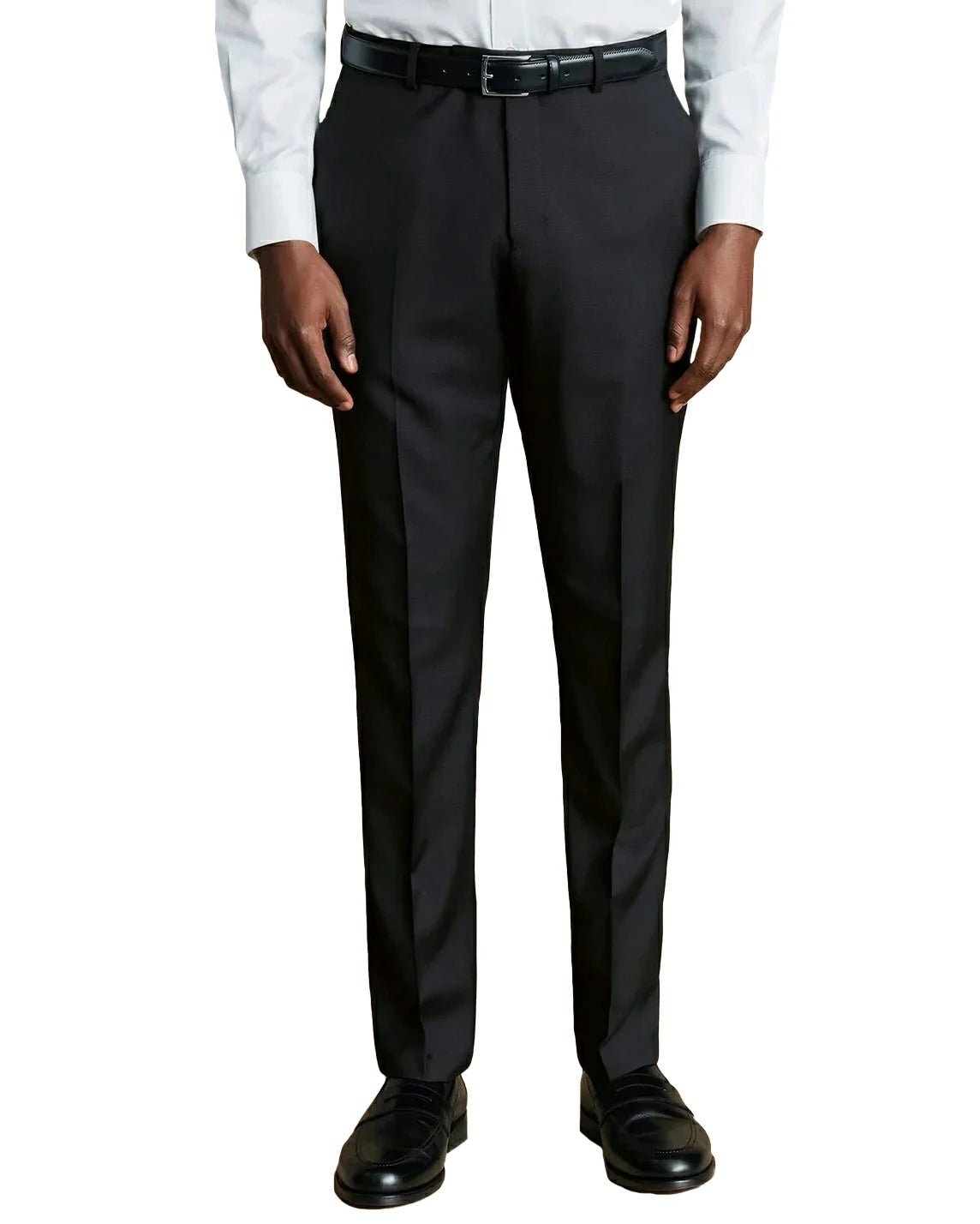 front view of a man wearing solid black slim dress pants with button and zipper closure