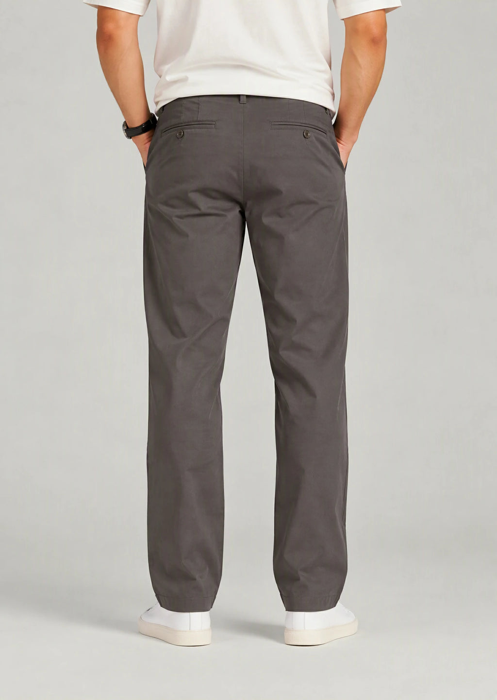 Back view of men's classic fit gray cotton pants with button welt back pockets, non-stretch casual trousers