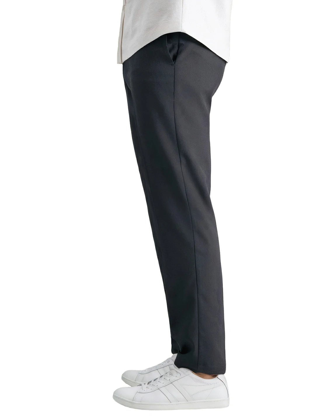 side view of a man wearing solid grey dress pants with two side pockets