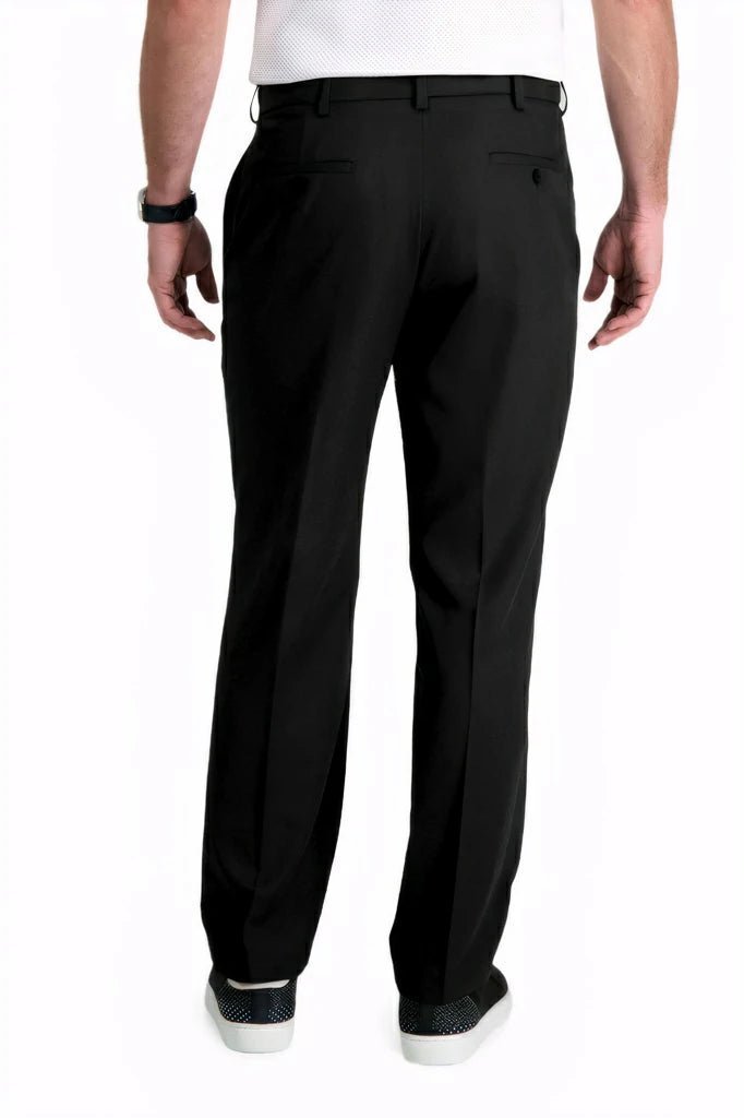 back view of a man wearing solid black golf pants with two back pockets