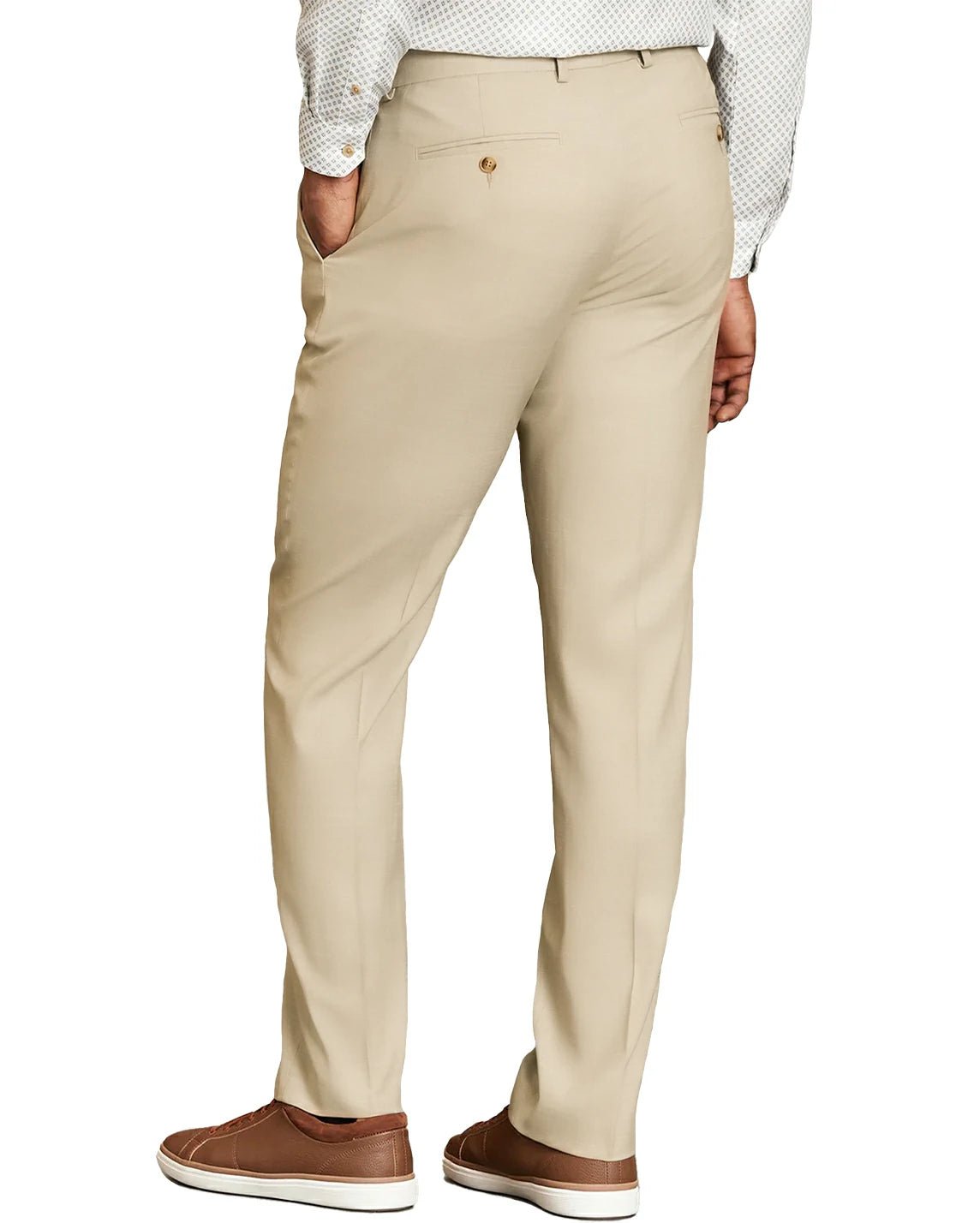 back view of a man wearing solid beige dress pants with button back pockets