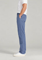 Side view men's indigo blue casual cotton pants, straight leg classic fit with hidden expandable waist for comfort