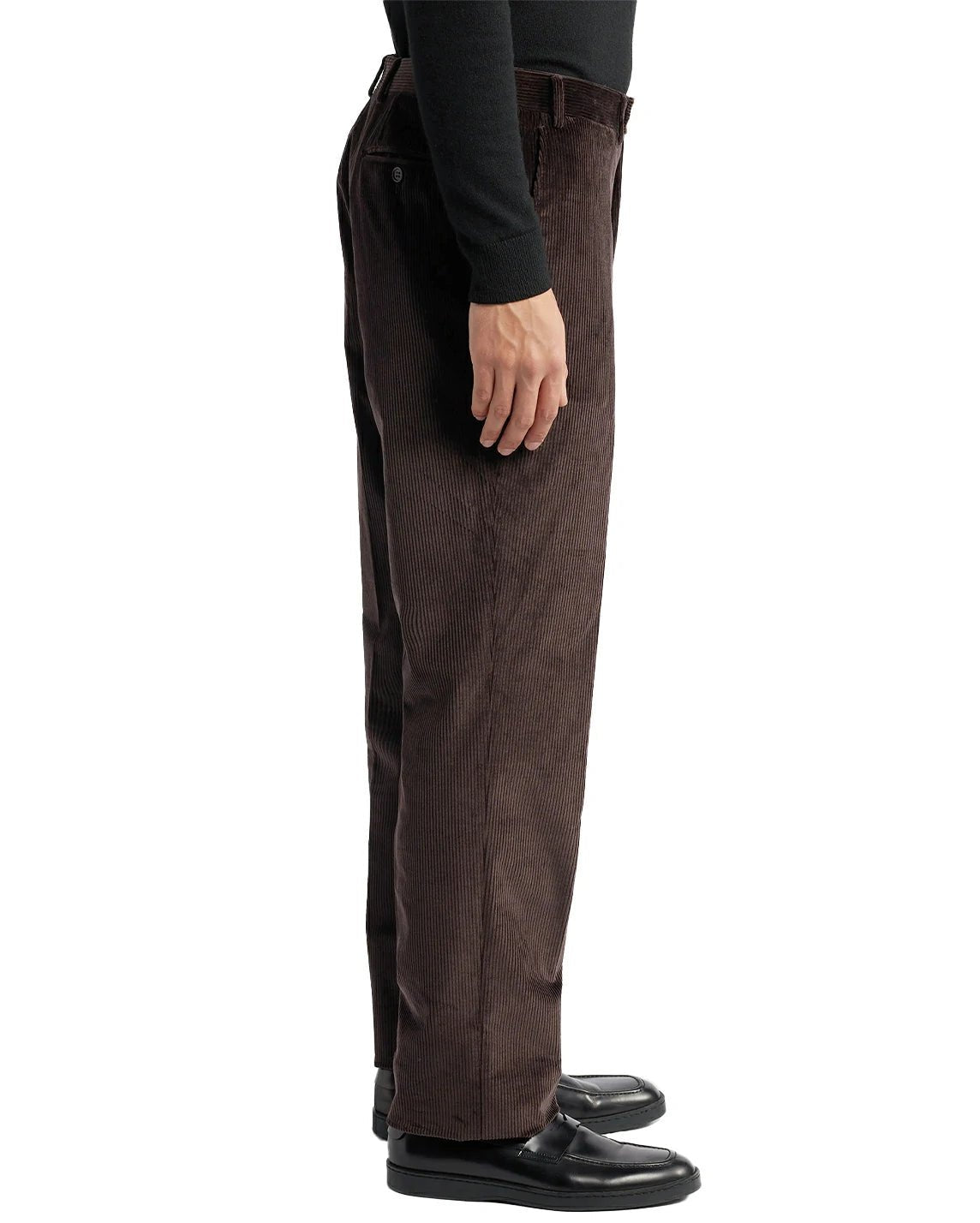 side view of a man wearing solid brown corduroy pants with side pockets