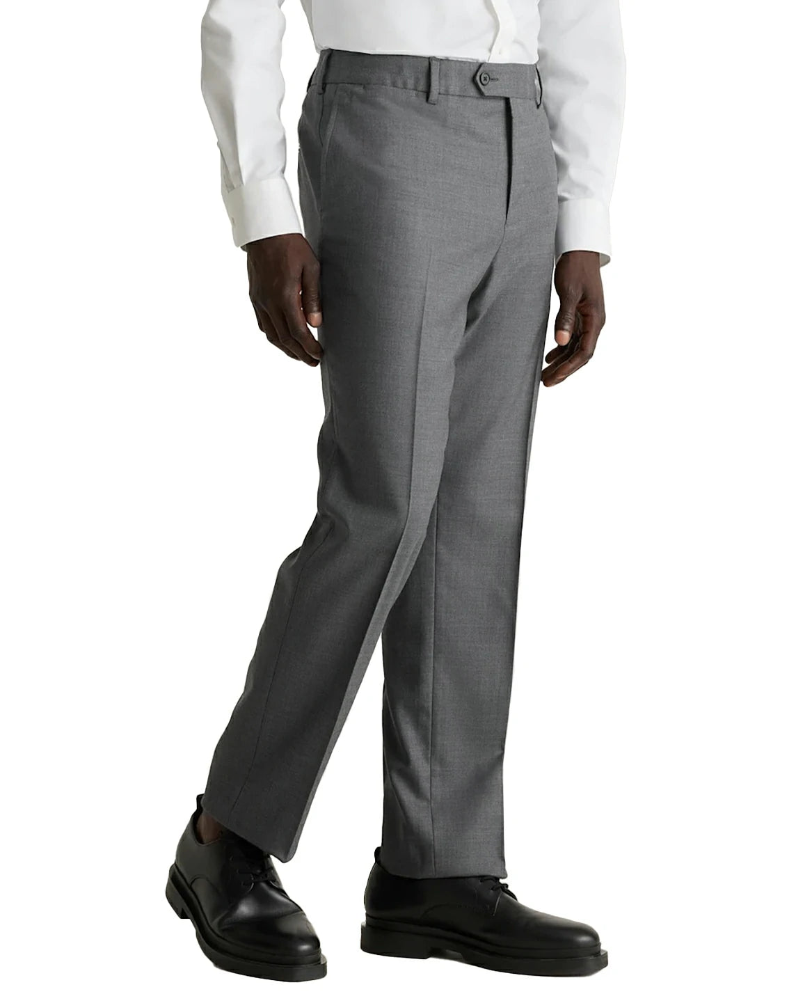 side view of a man wearing solid grey pants with side pockets