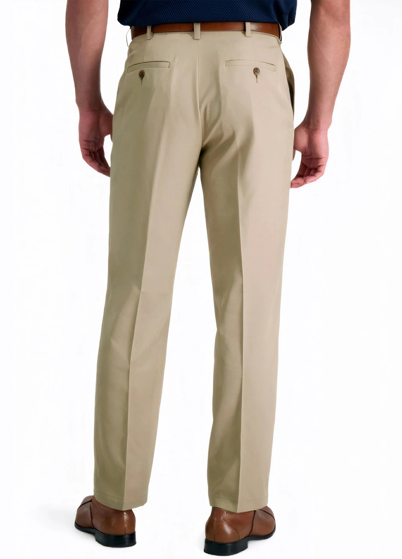 back view of a man wearing solid khaki dress pants with button back pockets