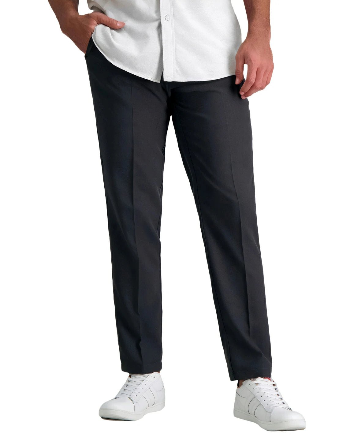 front view of a man wearing solid grey stretch dress pants with button and zipper closure