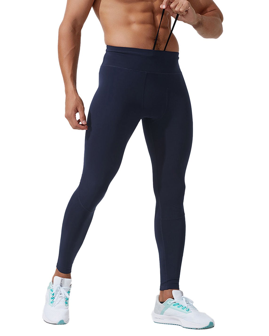 front view of a man wearing navy blue athletic leggings with a hidden internal drawstring