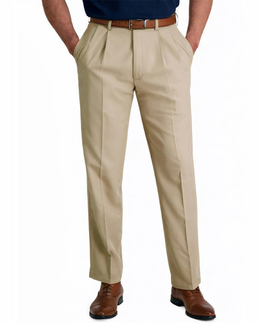 front view of a man wearing solid khaki pleated dress pants with button and zipper closure