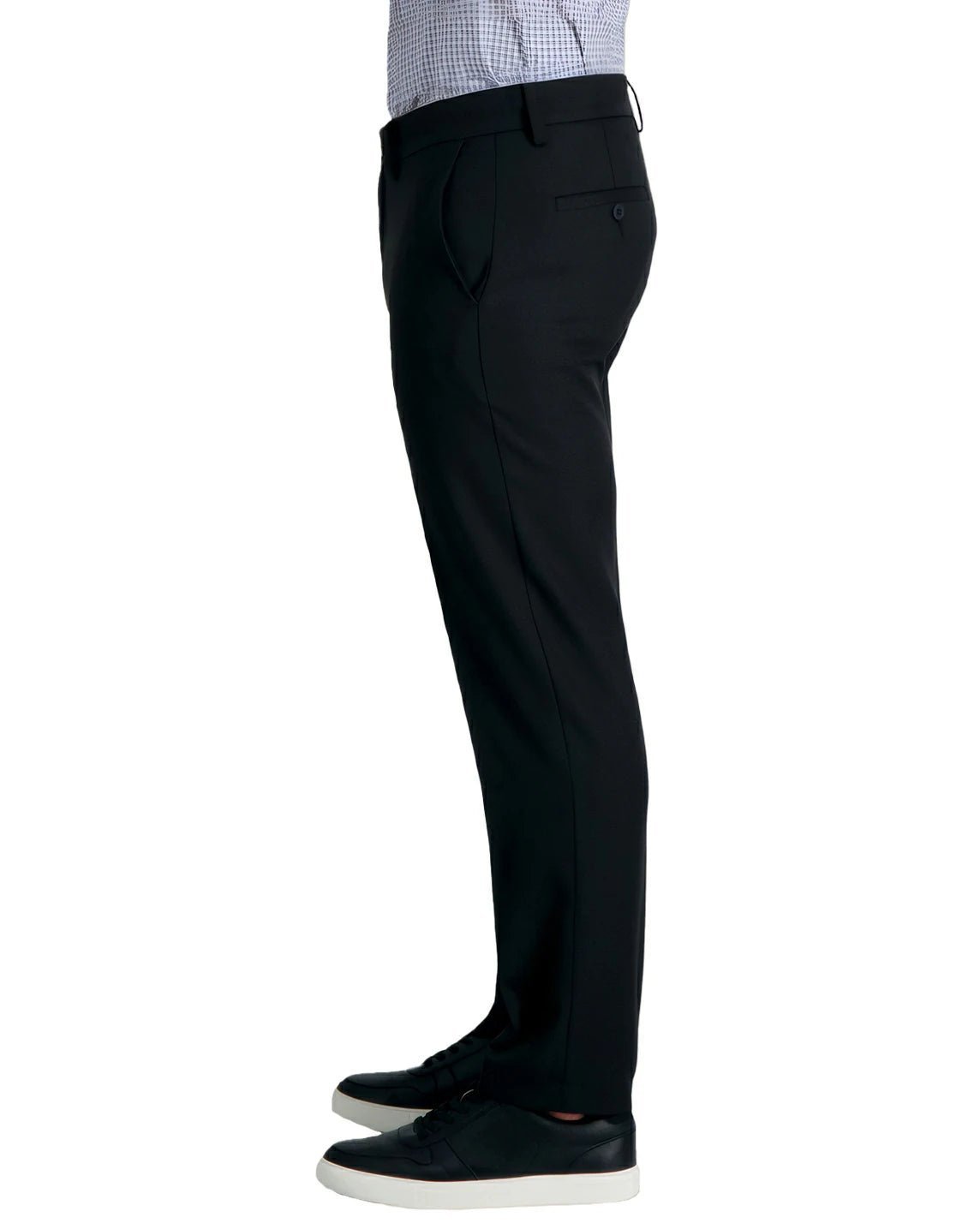 side view of a man wearing solid black dress pants with two side pockets