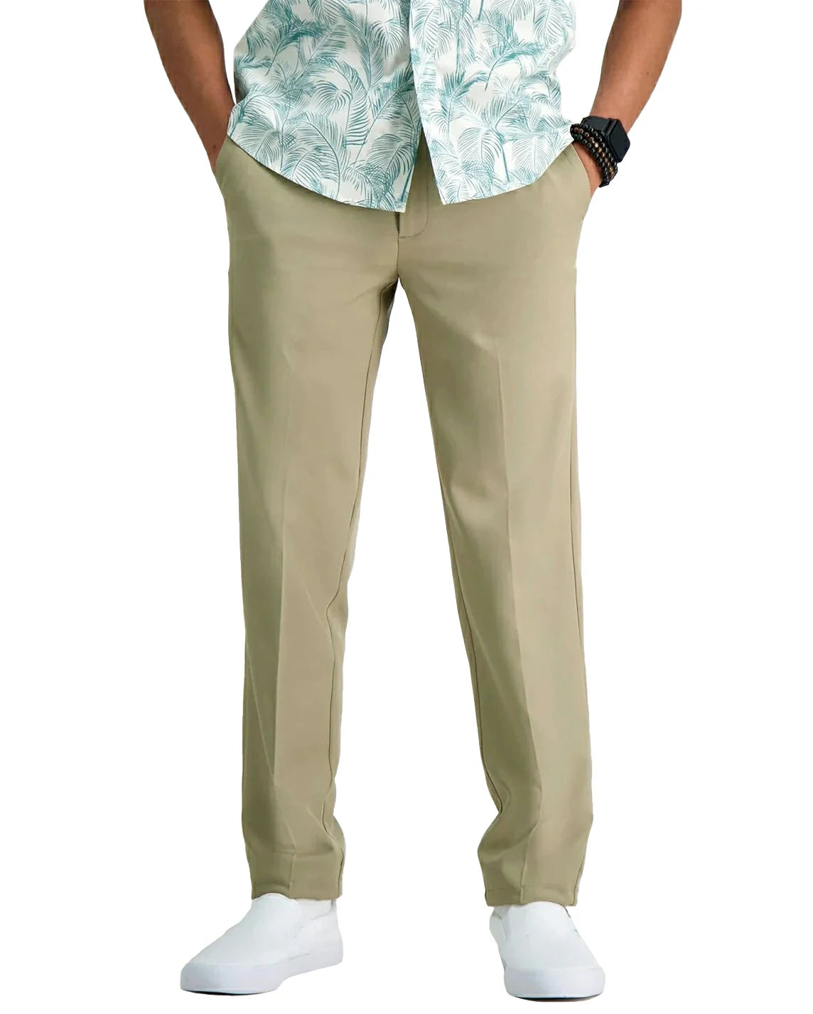 front view of a man wearing solid khaki dress pants with button and zipper closure