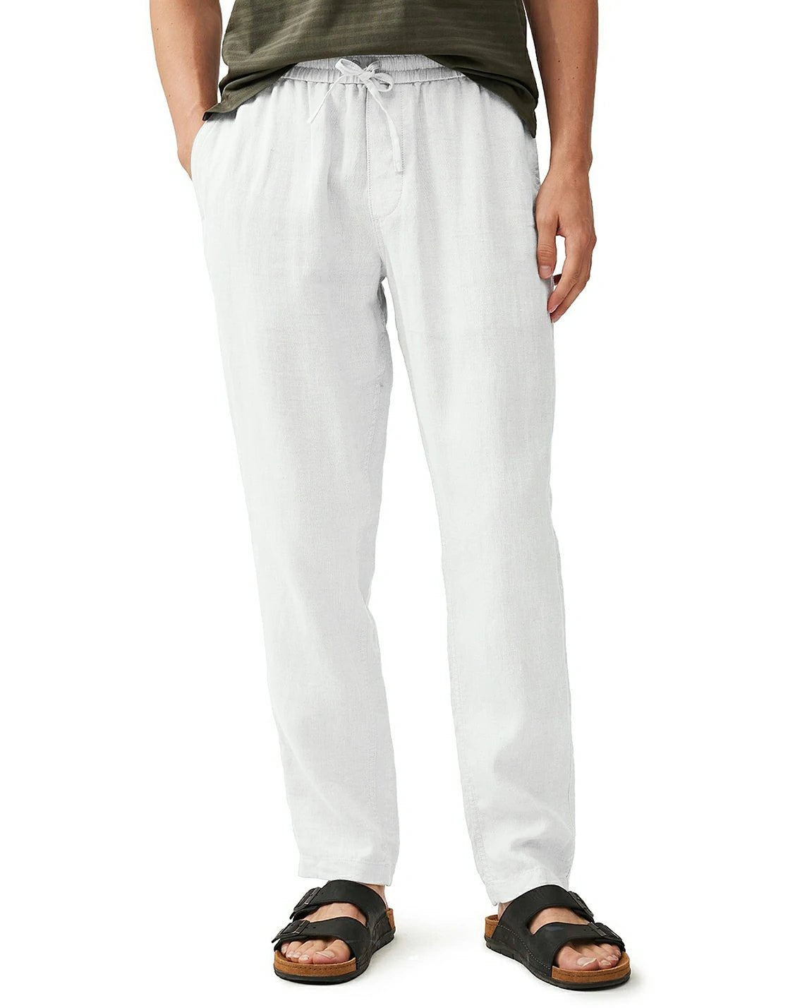 front view of a man wearing solid white linen pants with drawstring